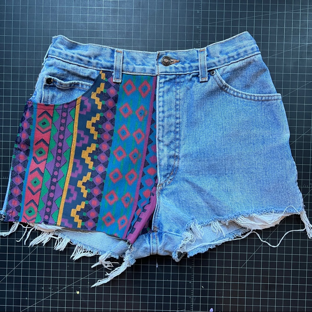 Upcycled denim shorts with painted details